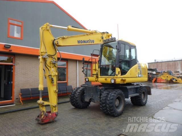 Komatsu PW 140-7 حفارات بعجل