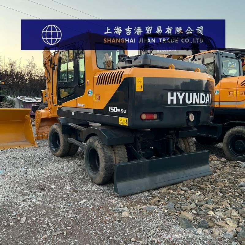 Hyundai R 150 W حفارات بعجل