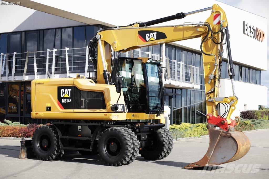 CAT M 314 F حفارات بعجل