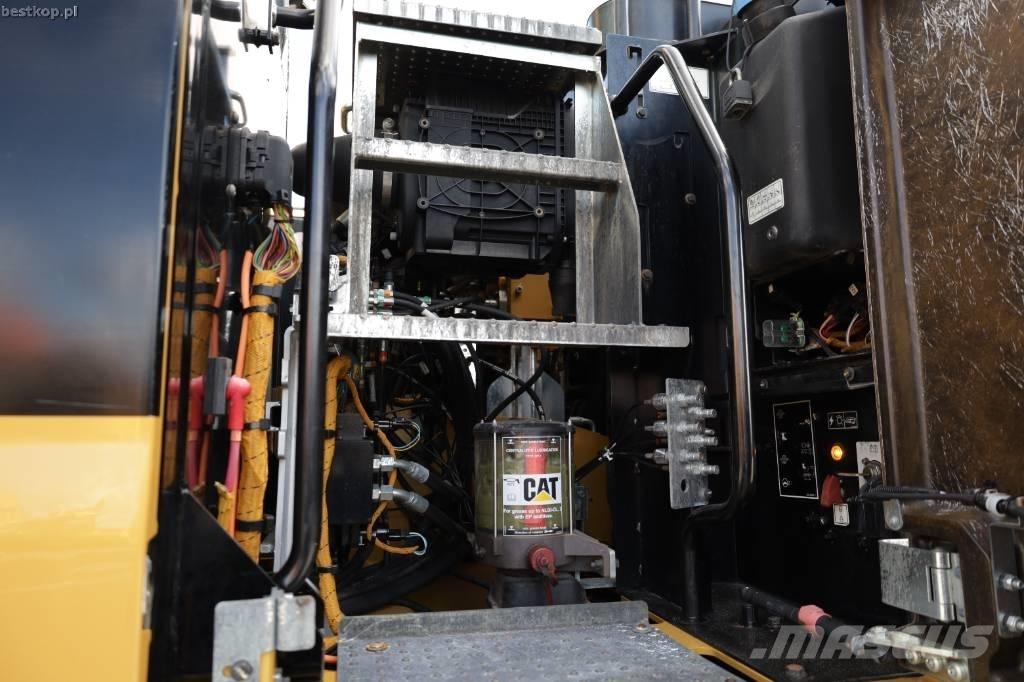 CAT M 314 F حفارات بعجل