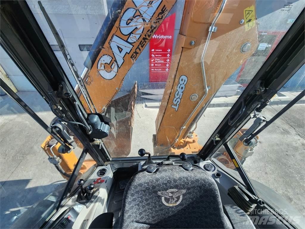 CASE CE 695ST لوادر ذات جرافات عكسية