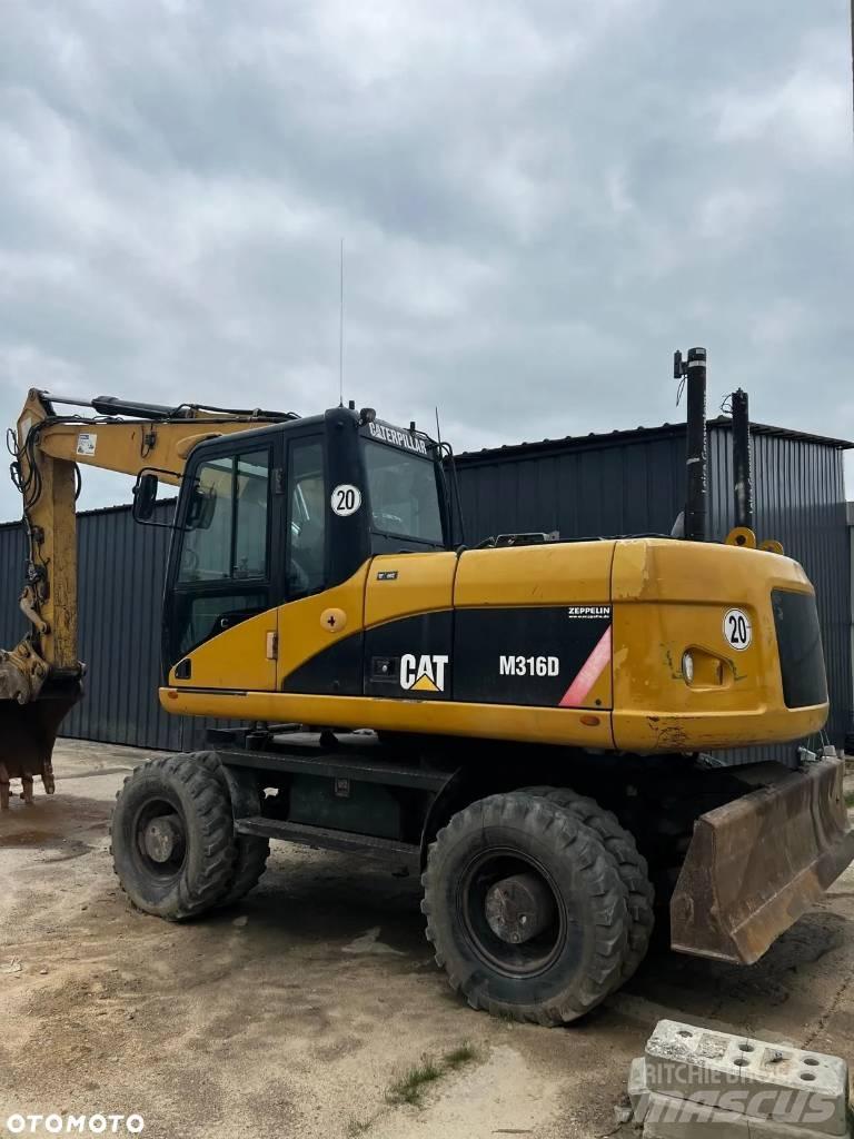 CAT M 316 D حفارات بعجل