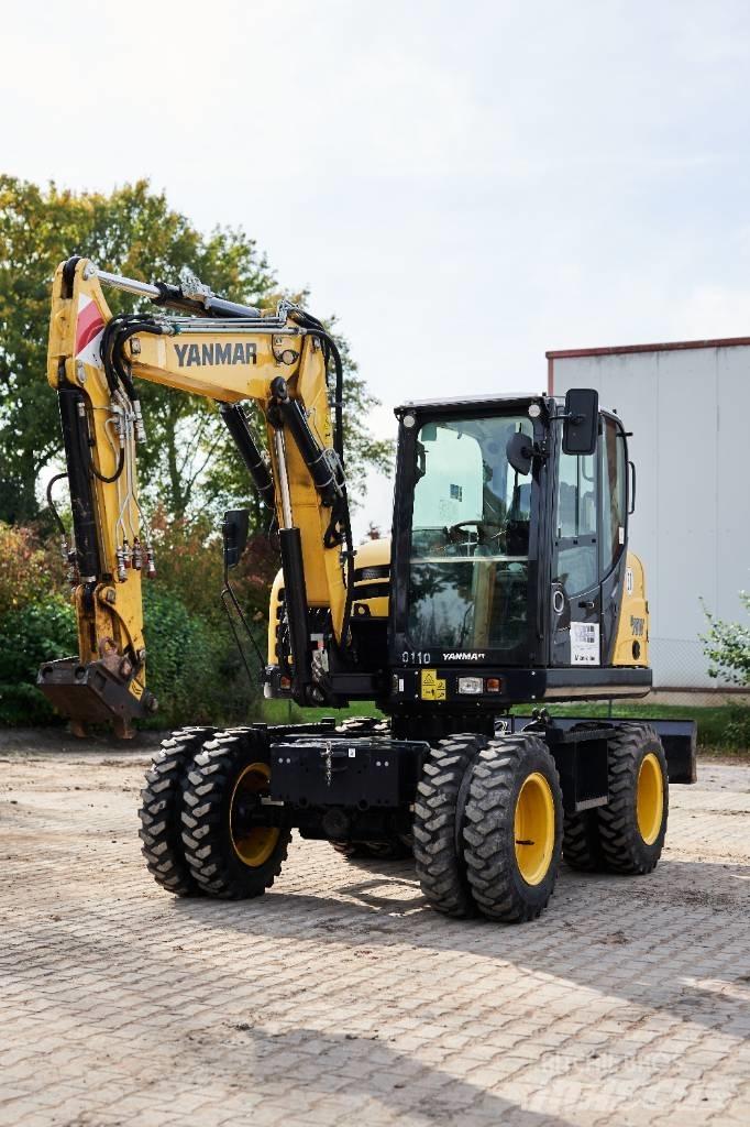 Yanmar B 75 W حفارات بعجل