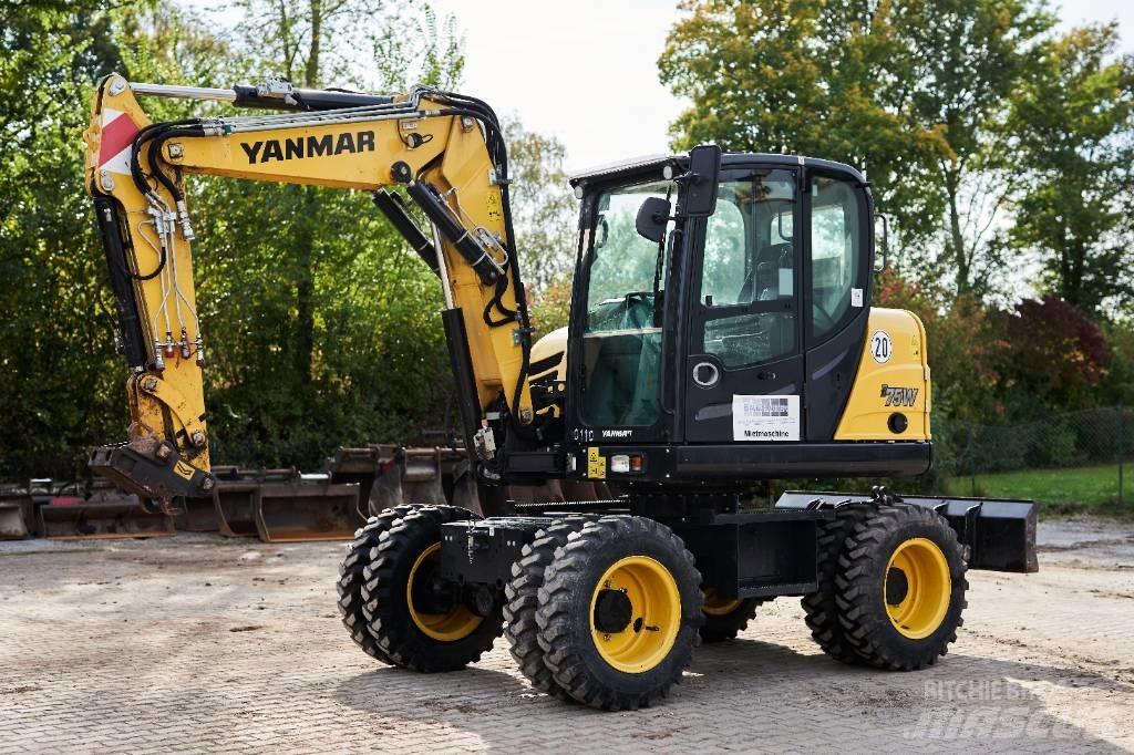 Yanmar B 75 W حفارات بعجل