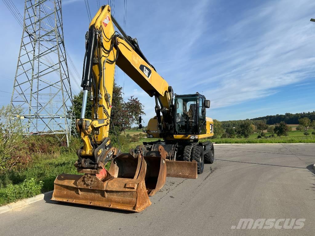CAT M 322 D حفارات بعجل