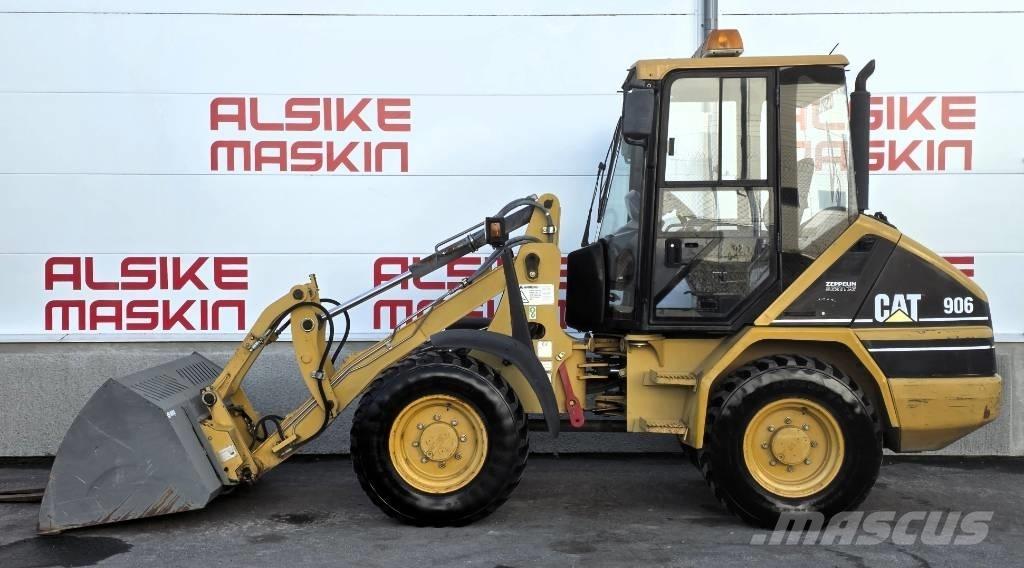 CAT 906 لوادر بعجل