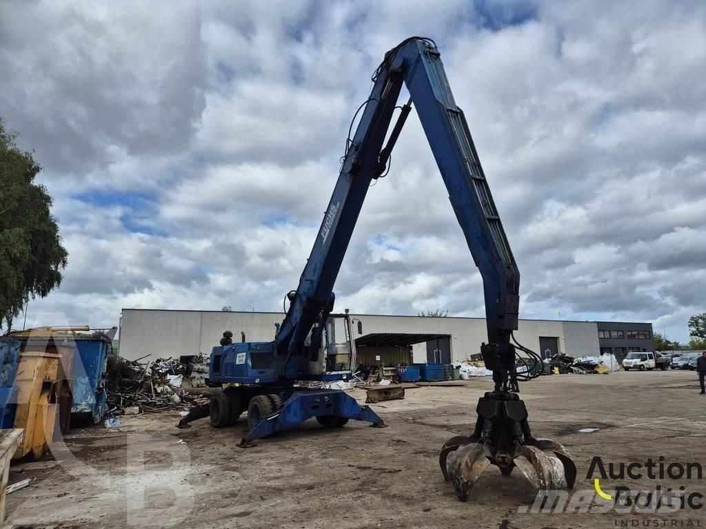 Fuchs MHL 350 حفارات بعجل