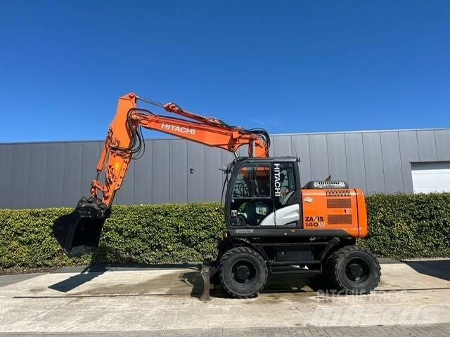 Hitachi 140W حفارات بعجل