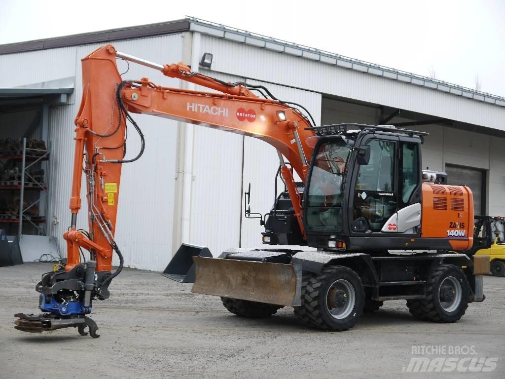 Hitachi ZX 140 W-6 حفارات بعجل