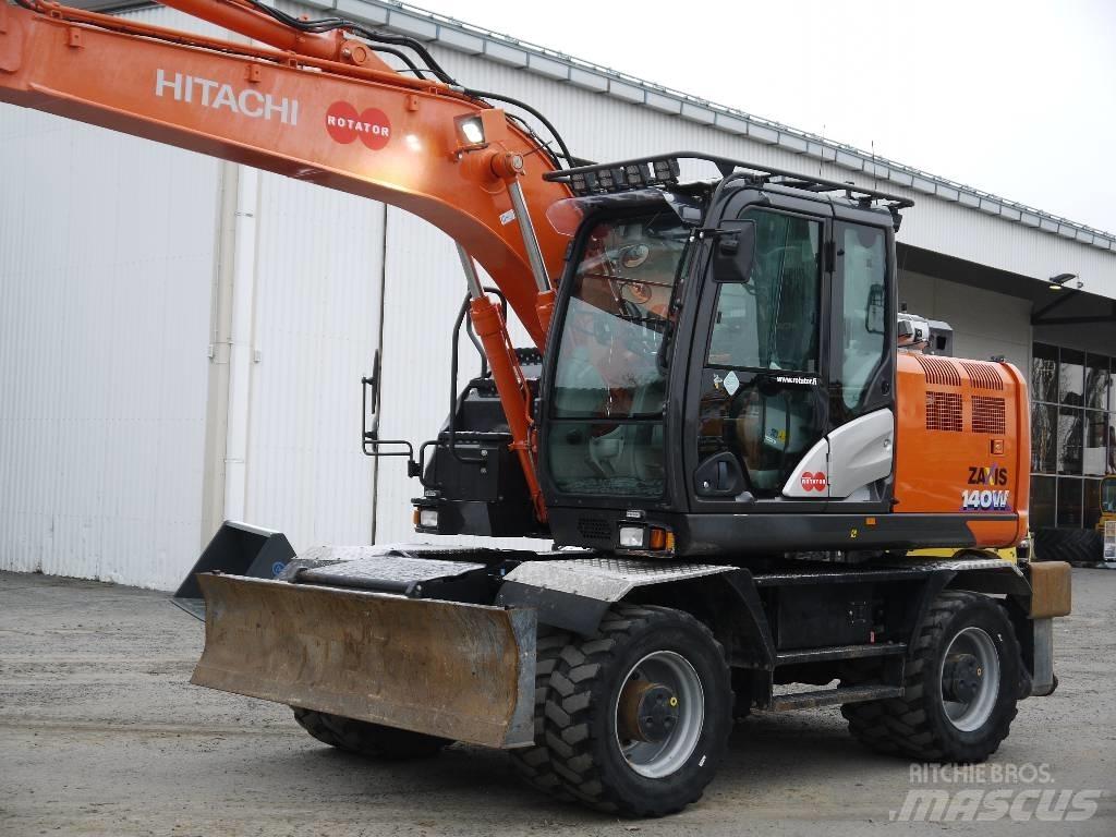 Hitachi ZX 140 W-6 حفارات بعجل