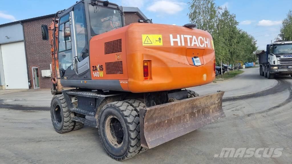 Hitachi ZX 140 W-3 حفارات بعجل