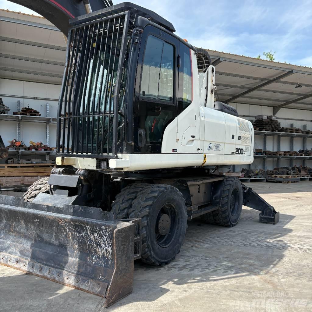 Hidromek HMK 200 W حفارات بعجل