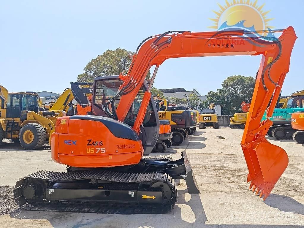 Hitachi ZX 75 US حفارات وسط 7 طن - 12 طن