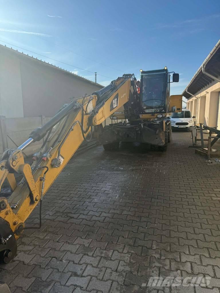 CAT M 315 D حفارات بعجل