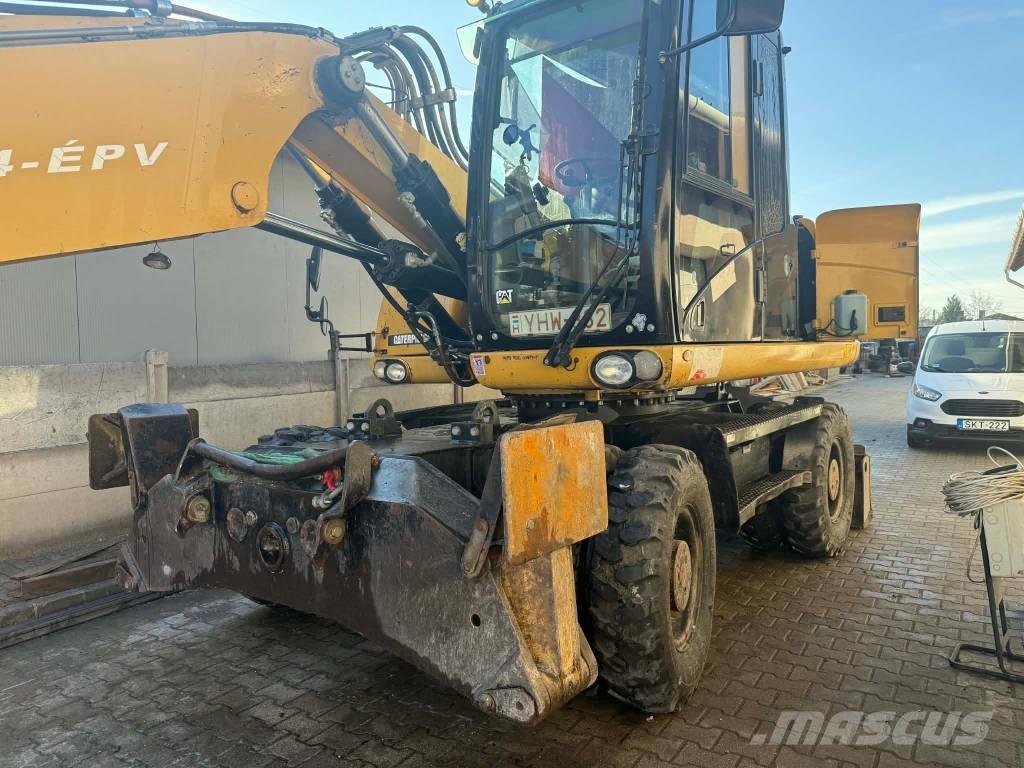CAT M 315 D حفارات بعجل