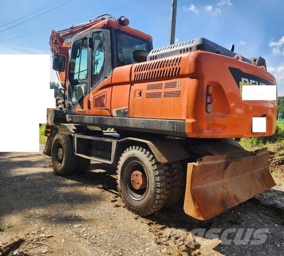 Doosan DX 210 W حفارات بعجل