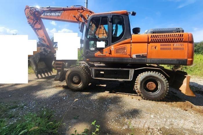 Doosan DX 210 W حفارات بعجل