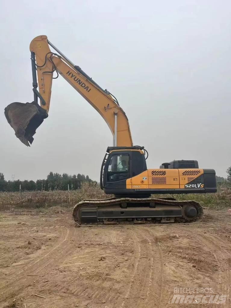 Hyundai Robex 520 VS حفارات زحافة