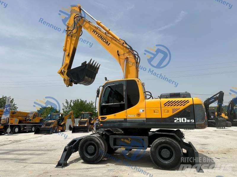 Hyundai R210W-9 حفارات بعجل