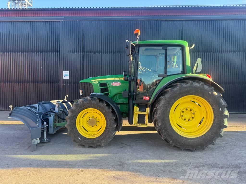John Deere 6430 الجرارات
