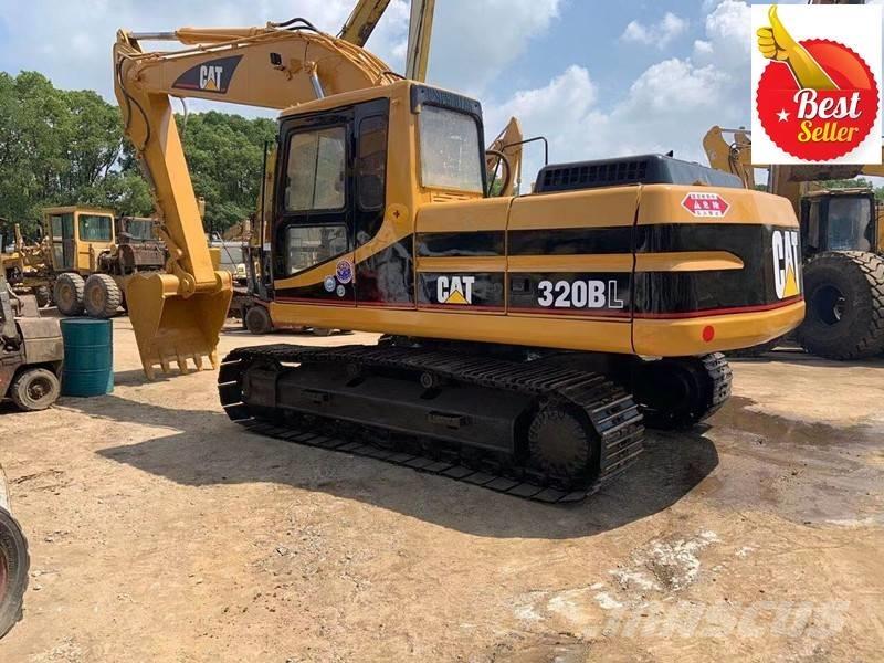 CAT 320 B حفارات زحافة