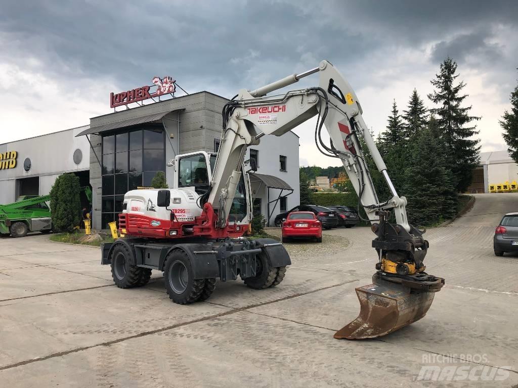 Takeuchi TB295W حفارات بعجل