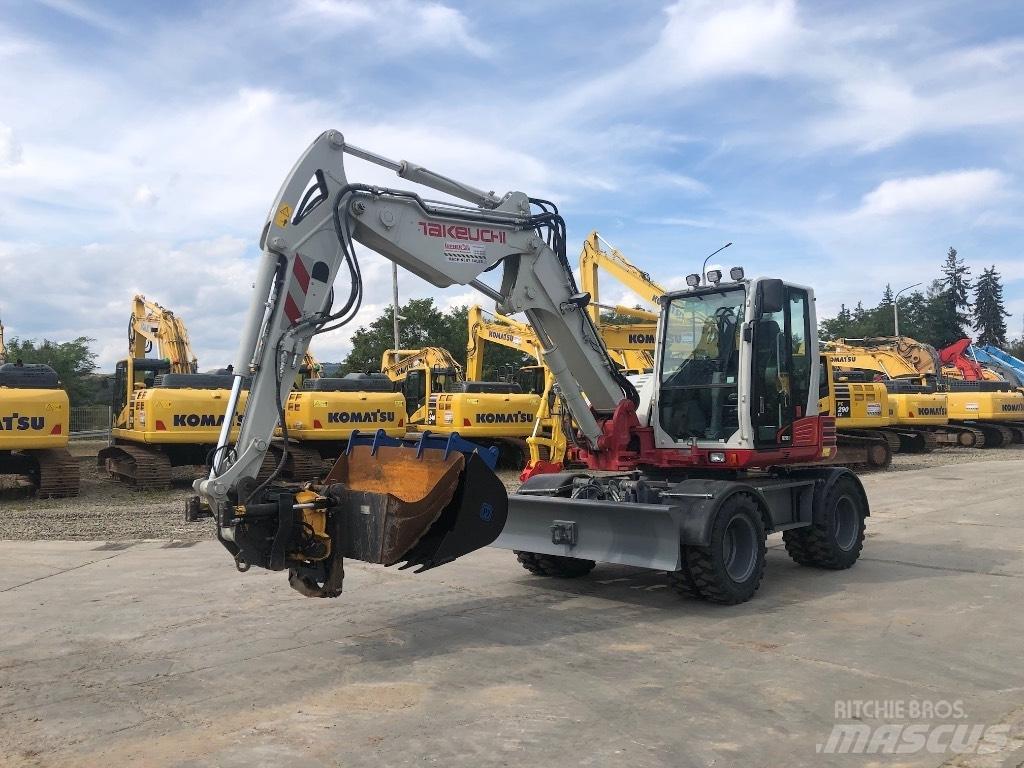 Takeuchi TB295W حفارات بعجل