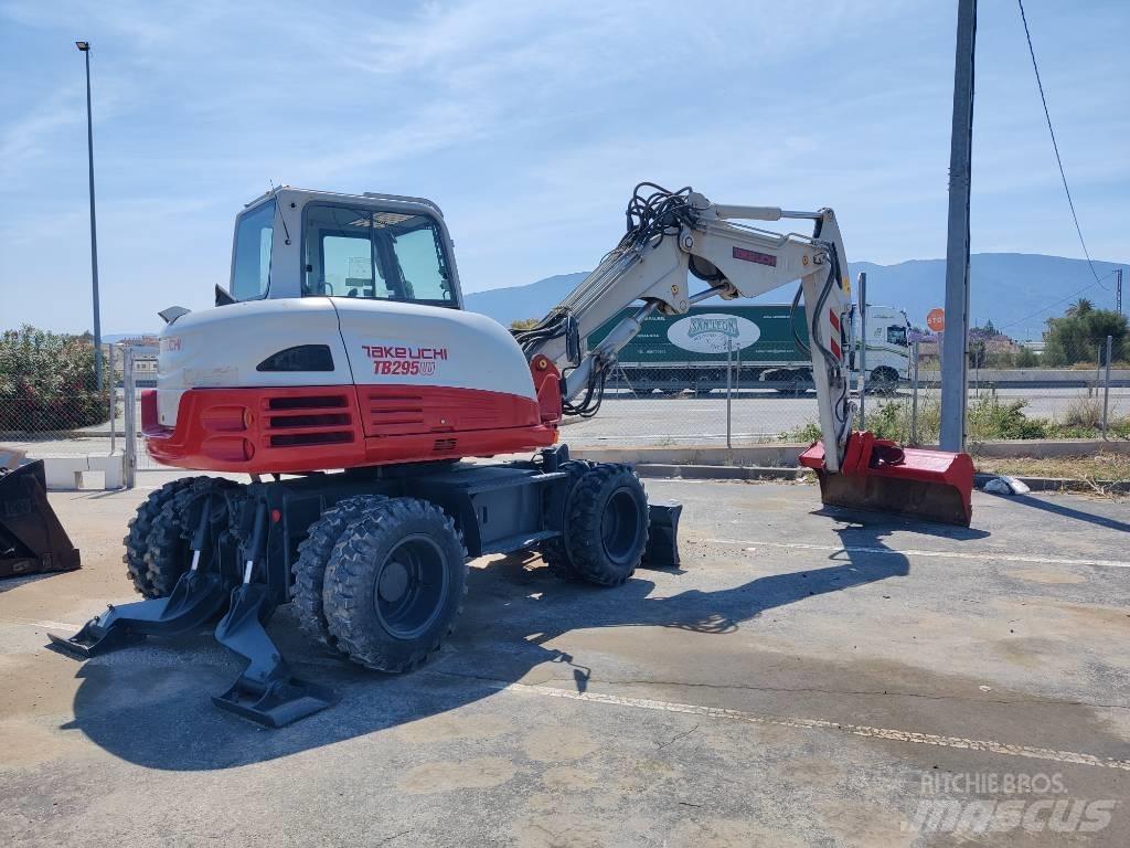 Takeuchi TB 295 W حفارات بعجل