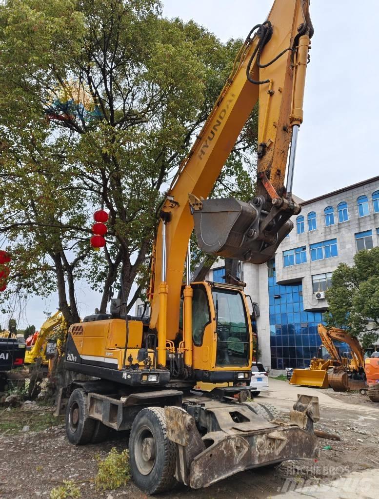 Hyundai R210W-9 حفارات بعجل