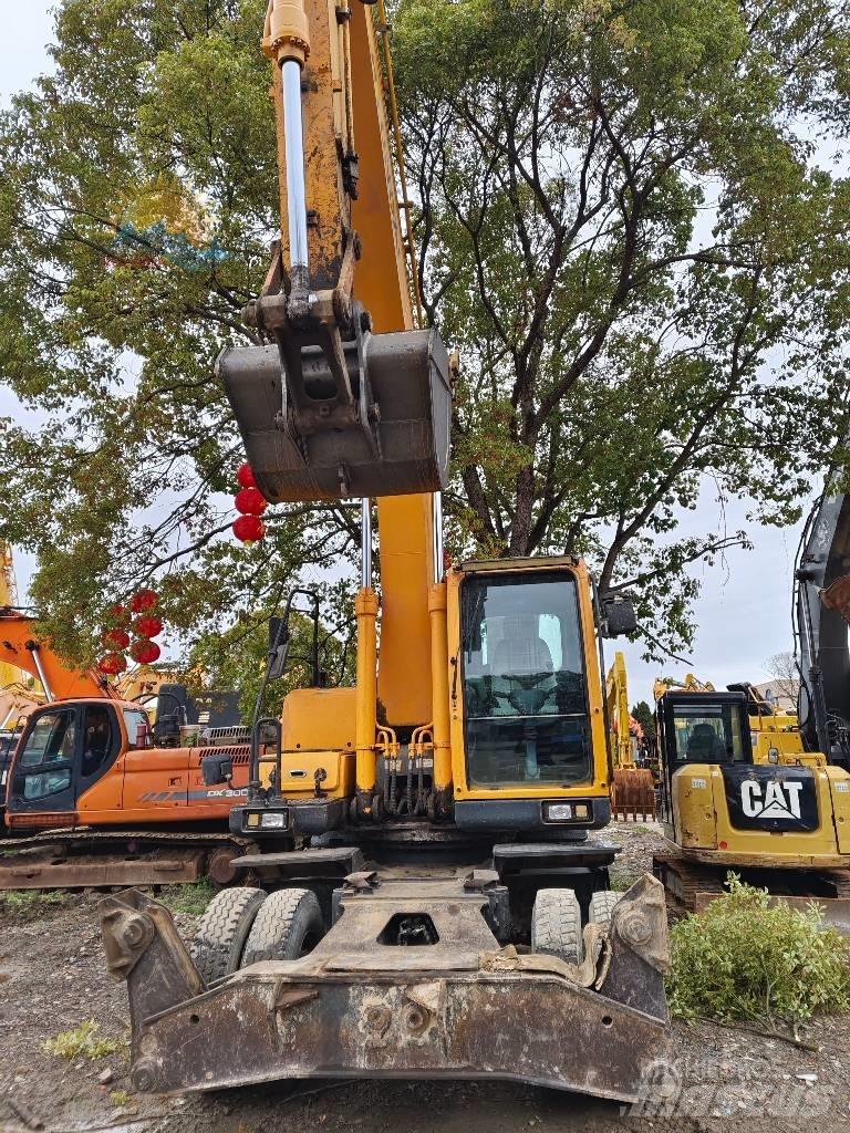 Hyundai R210W-9 حفارات بعجل