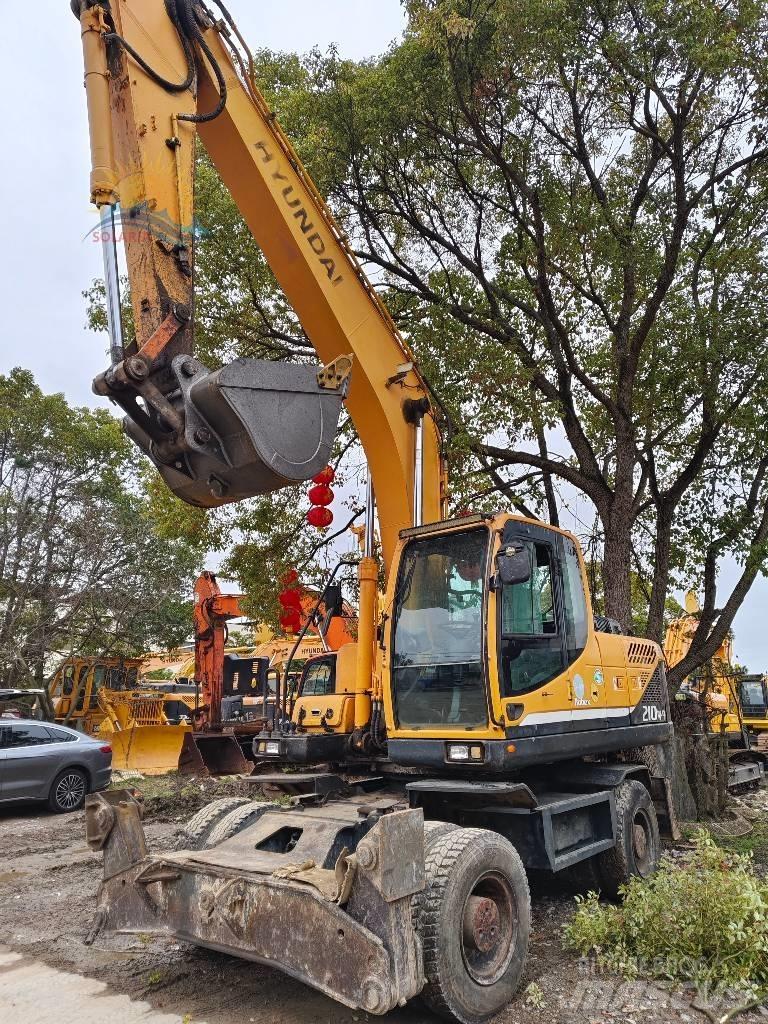 Hyundai R210W-9 حفارات بعجل