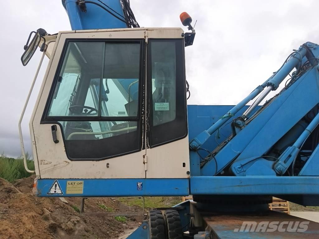 Fuchs MHL 360 مناولات المخلفات / مناولات صناعية