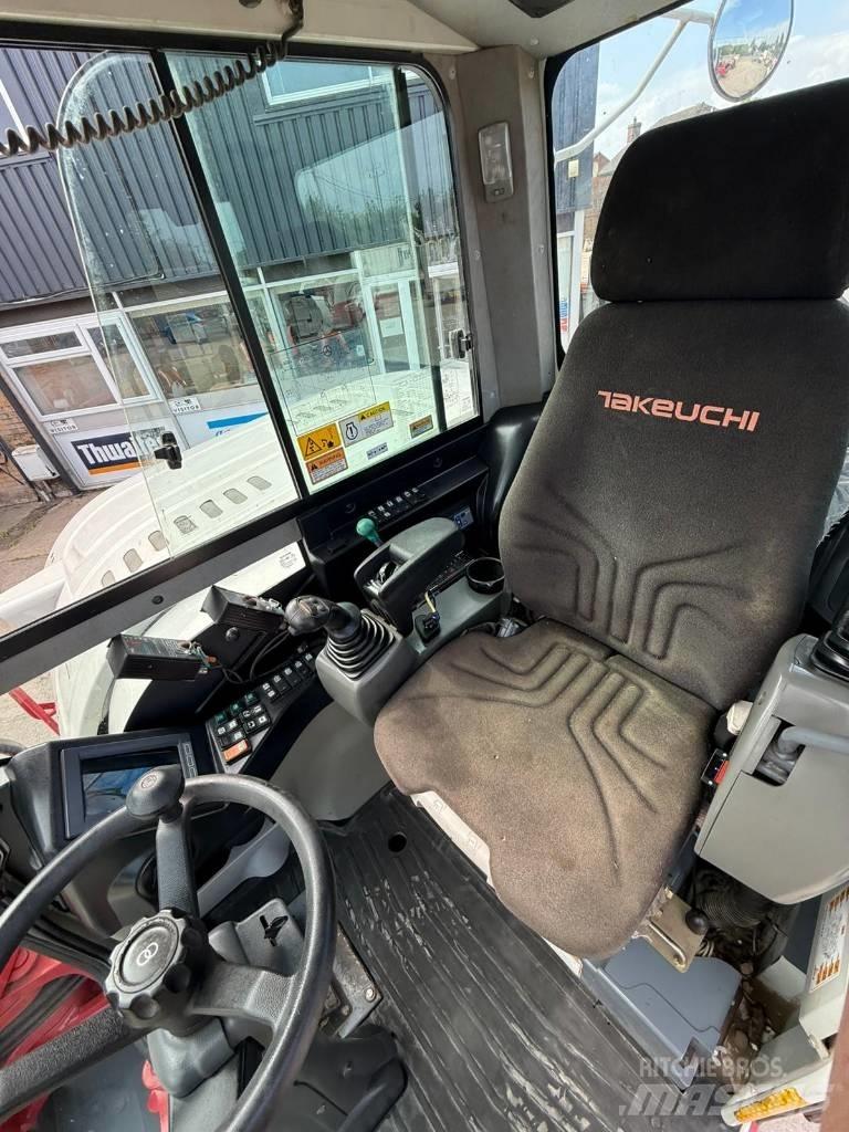 Takeuchi TB 295 W حفارات بعجل