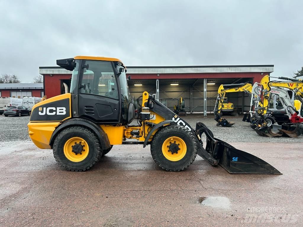 JCB 409 لوادر بعجل