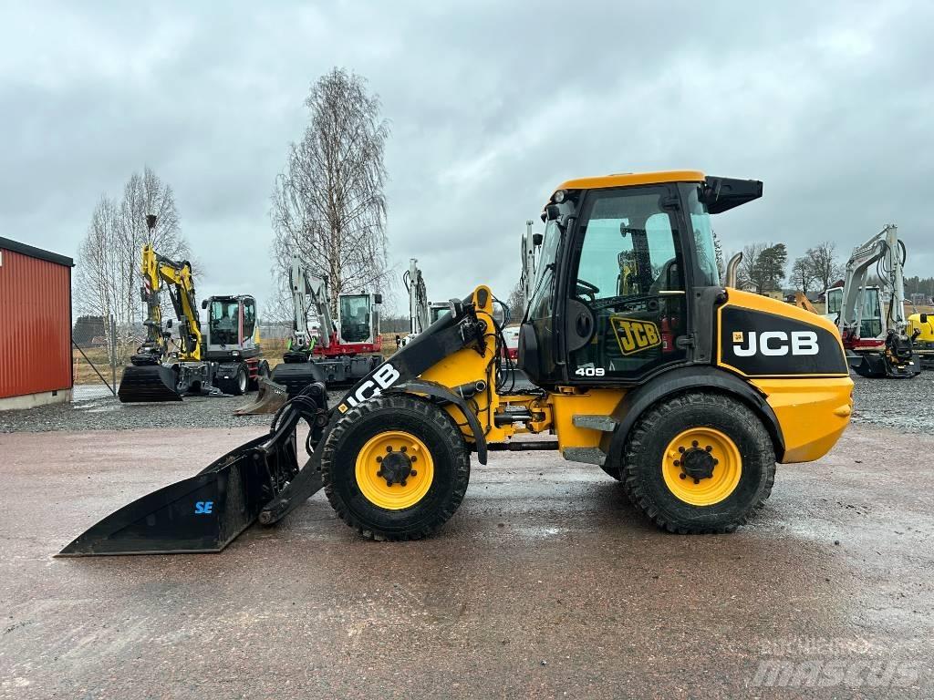 JCB 409 لوادر بعجل