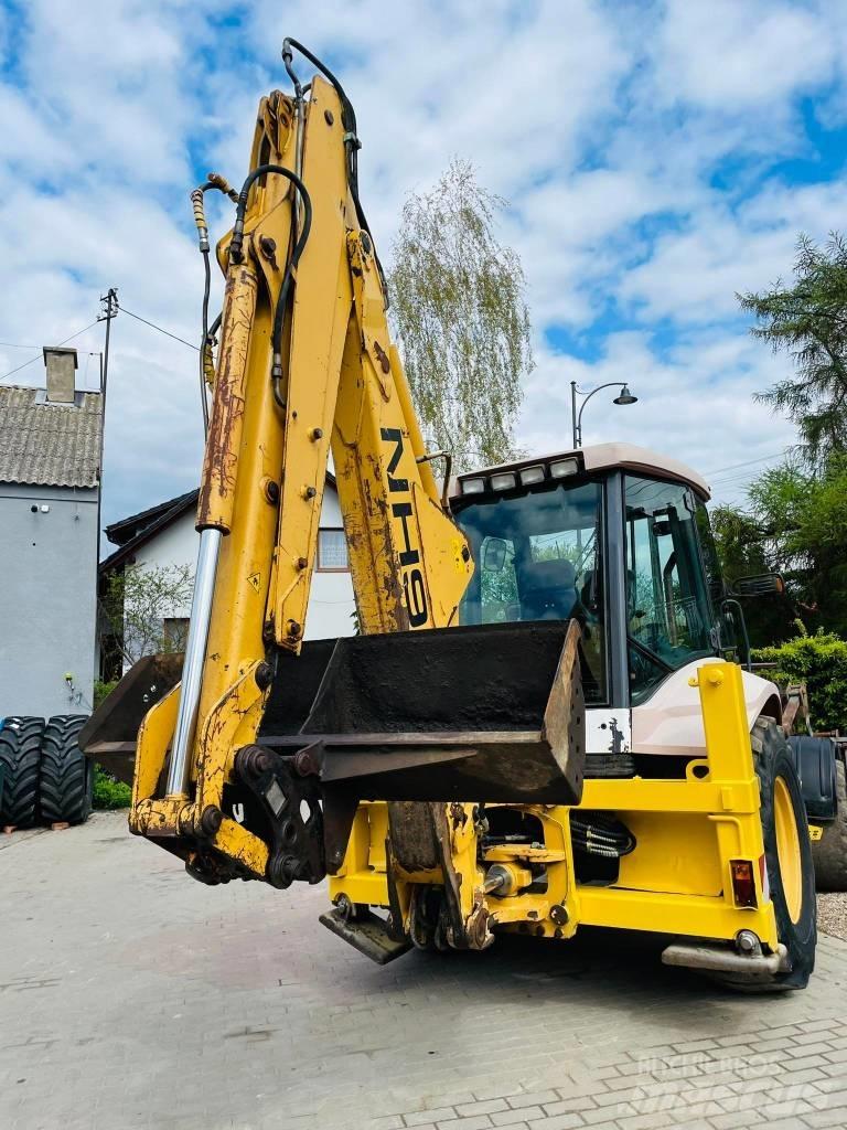 New Holland LB 95 لوادر ذات جرافات عكسية