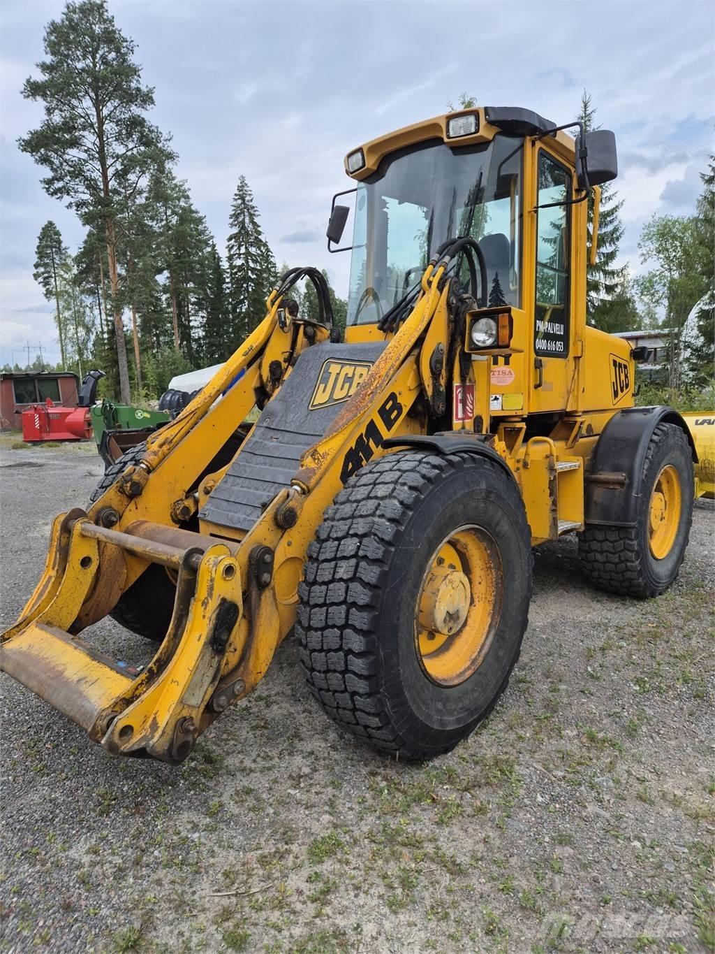 JCB 411B لوادر بعجل