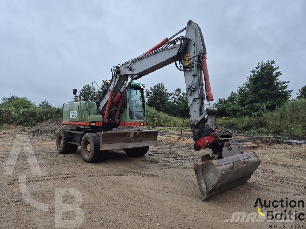 Volvo EW 140 C حفارات بعجل