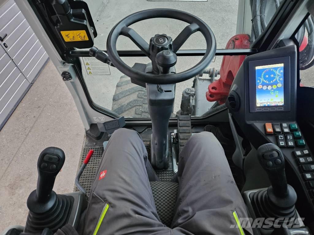 Takeuchi TB 295 W حفارات بعجل