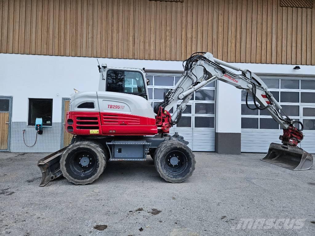 Takeuchi TB 295 W حفارات بعجل