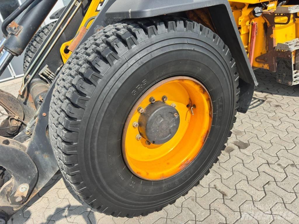 JCB 413 لوادر بعجل