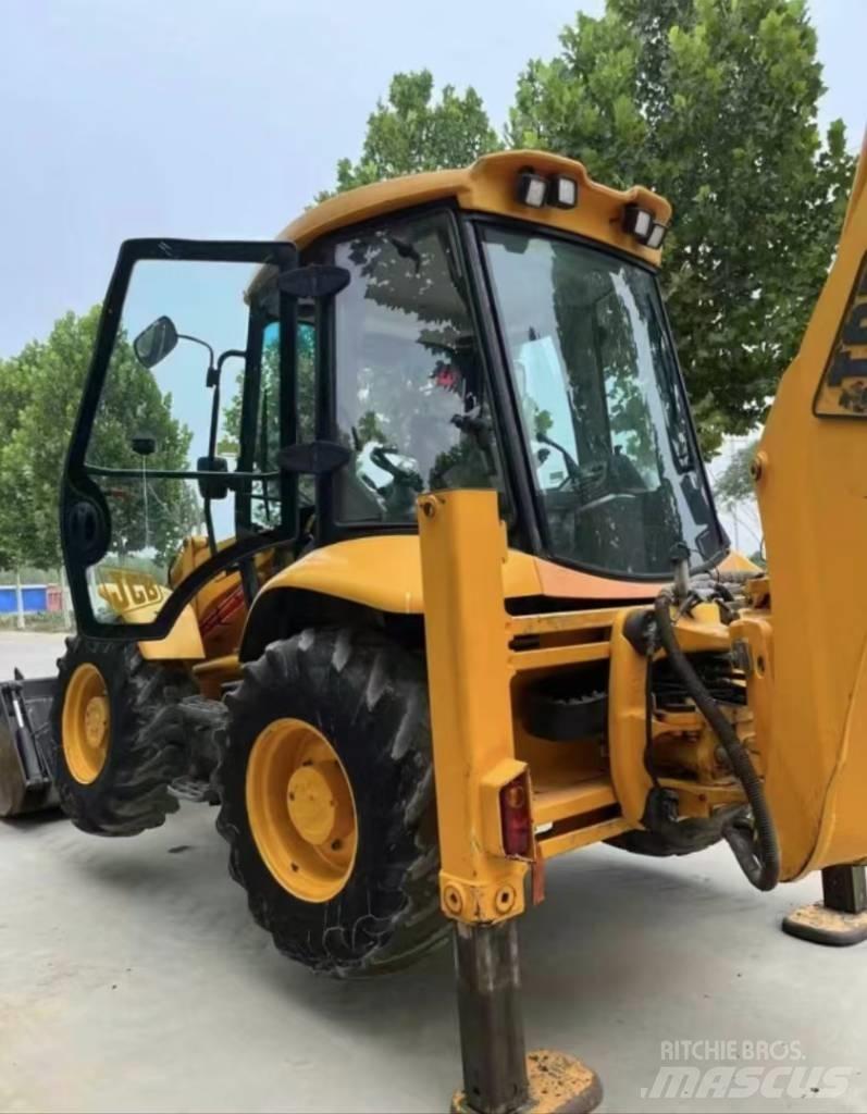 JCB 4 CX لوادر ذات جرافات عكسية