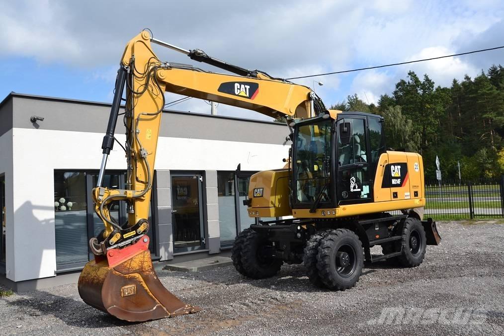 CAT M 314 F حفارات بعجل