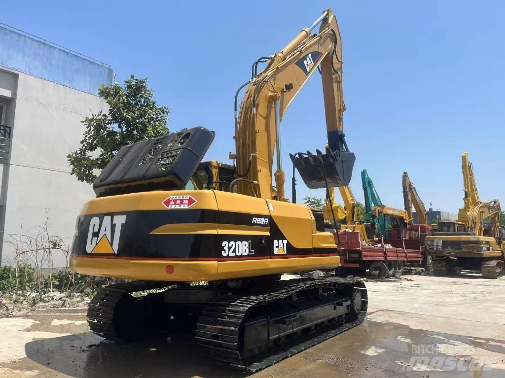 CAT 320 B L حفارات زحافة