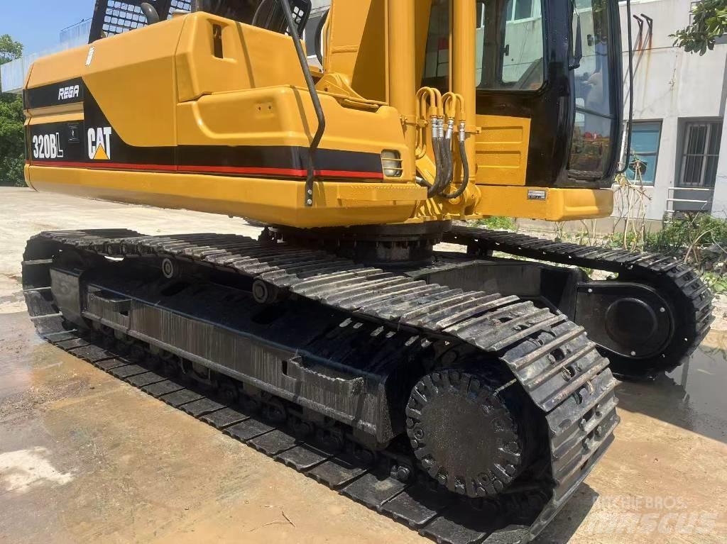 CAT 320 B L حفارات زحافة