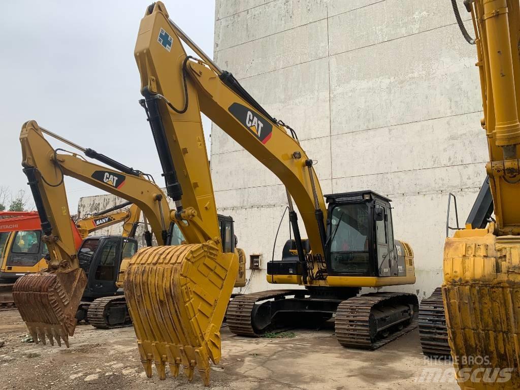 CAT 323 D L حفارات زحافة