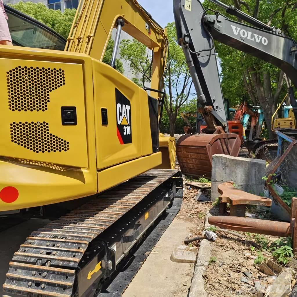 CAT 310 حفارات زحافة