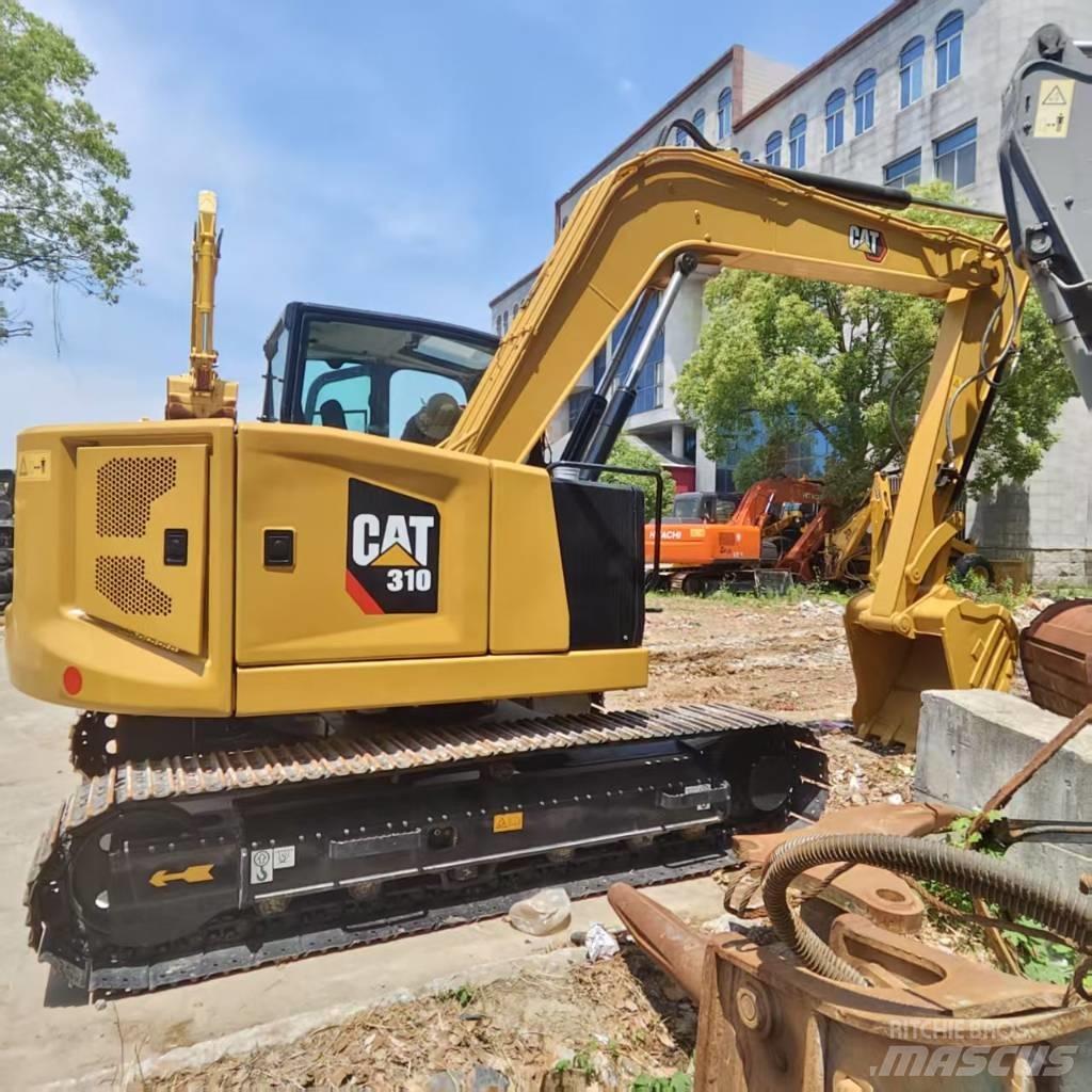 CAT 310 حفارات زحافة