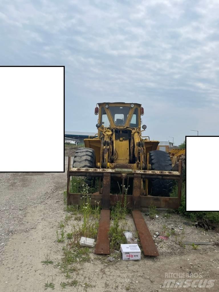 CAT 980 B لوادر بعجل