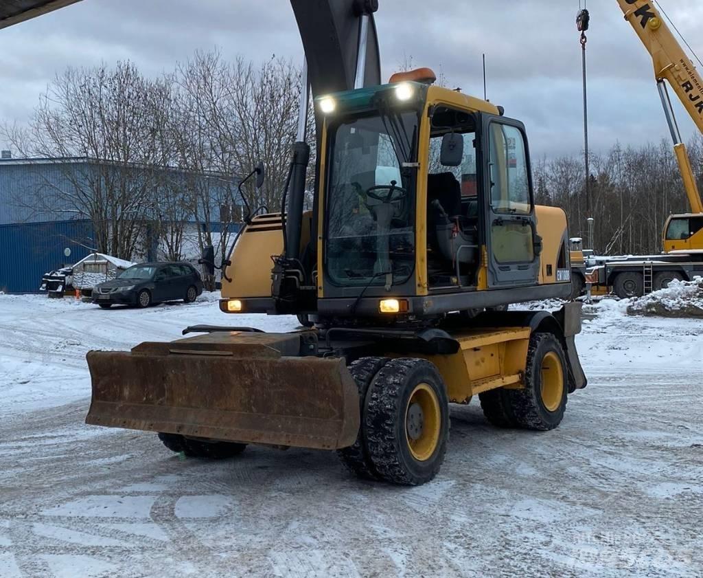Volvo EW 180 B حفارات بعجل